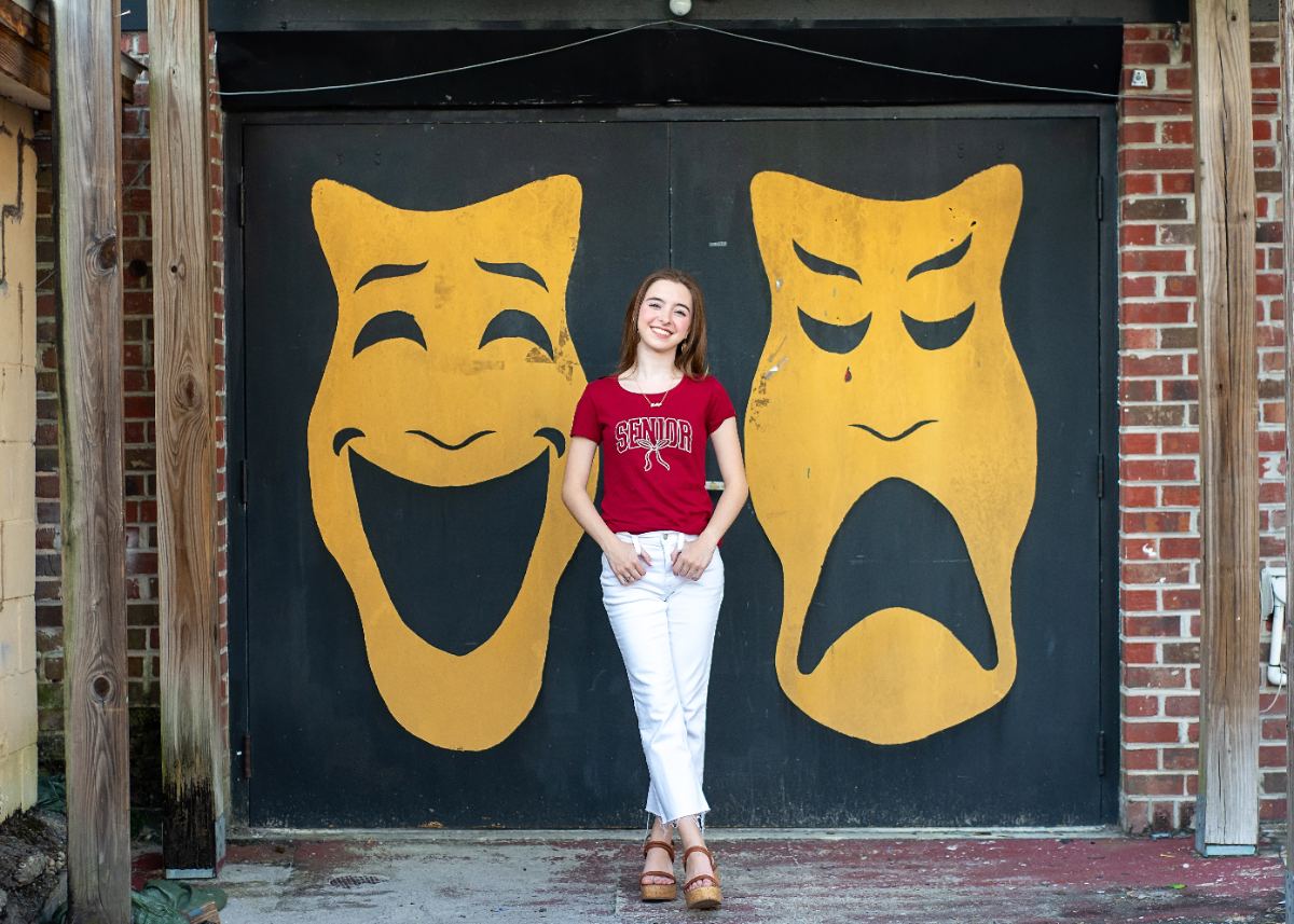 Kaitlyn at theatre mural